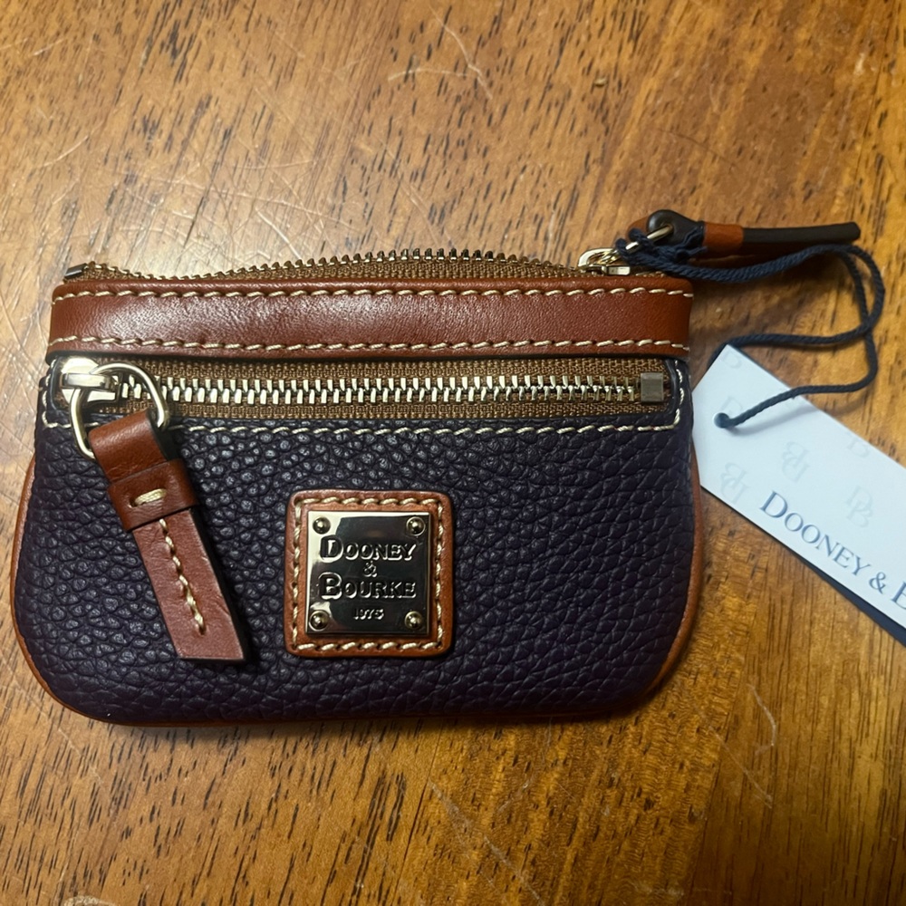 Dooney & Bourke Plum and Brown Leather Pouch